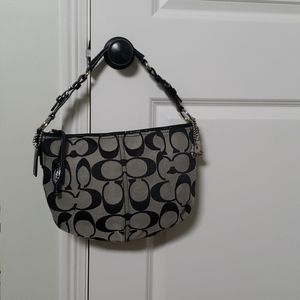 Black and silver Coach purse